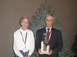 Sam Cartner was recognized for his years of service to the industry when he was presented with the Lifetime Achievement Award at the 2006 National Christmas Tree Association Biennial Convention in Portland, OR.